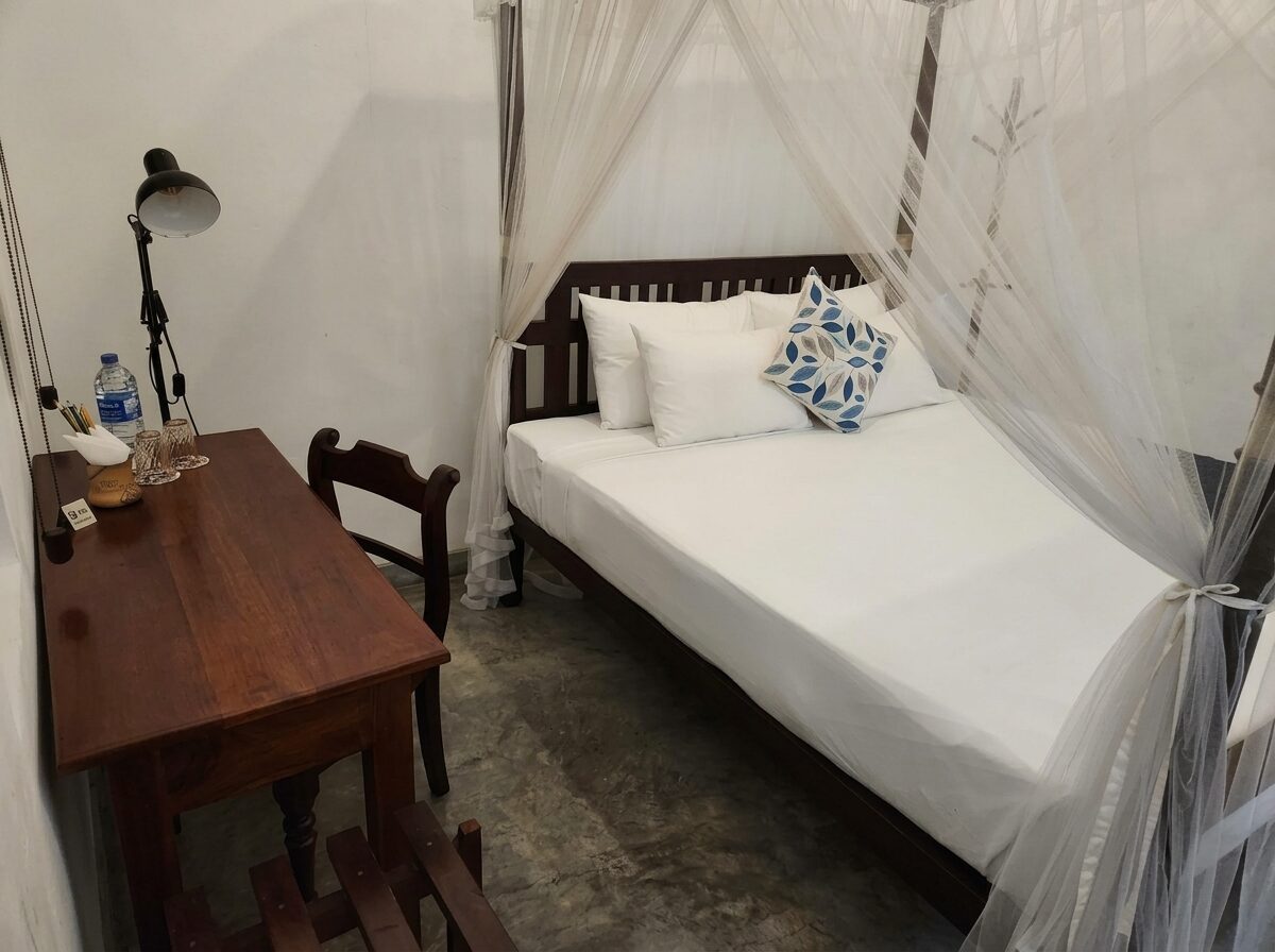 Desk Room — canopy bed and teak writing desk